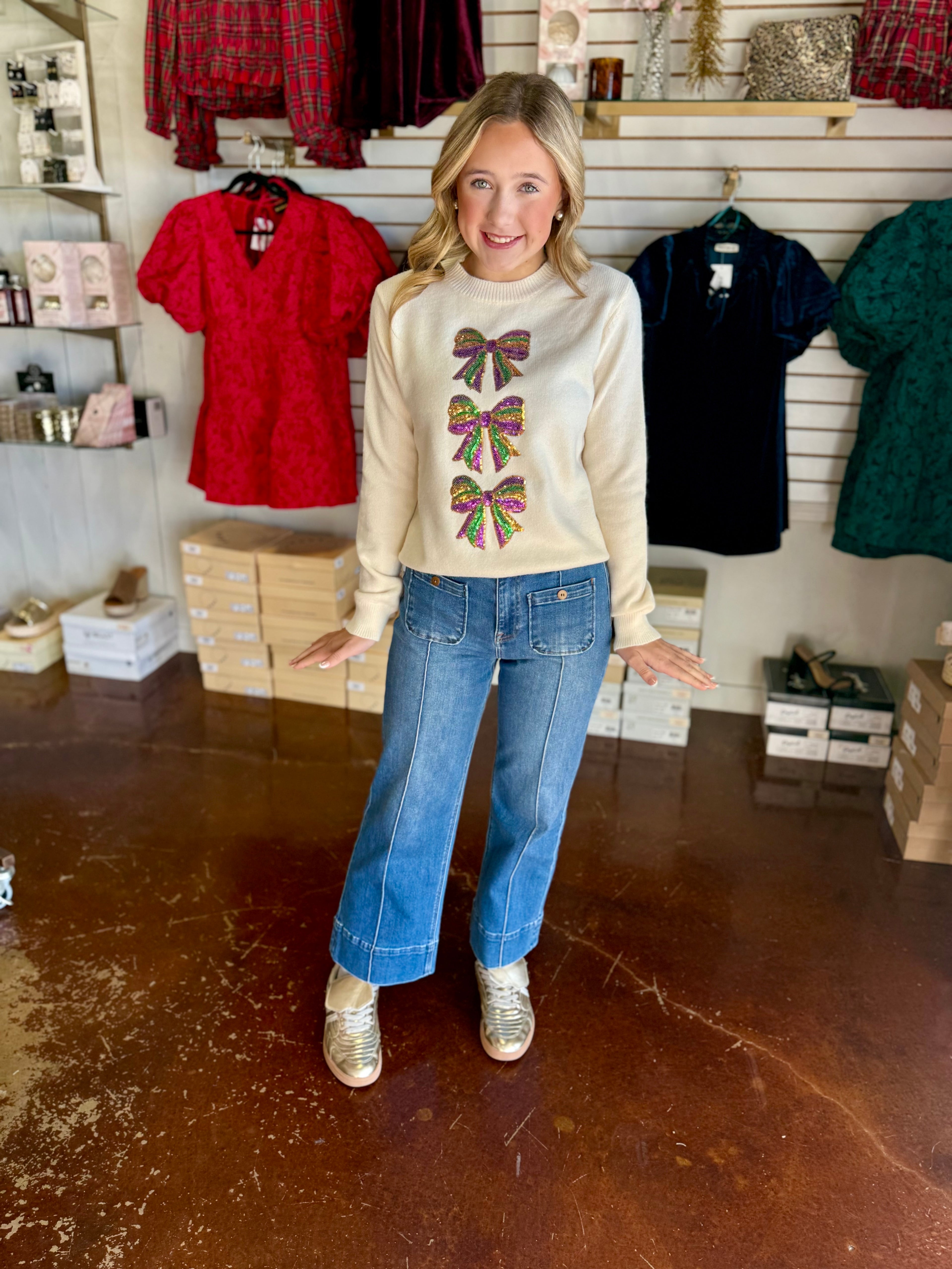 The Mardi Gras Bow Knit Sweater